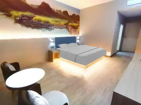 XinfengyaduoBusiness Hotel Отели рядом с достопримечательностью «Huafeng Hot Spring»