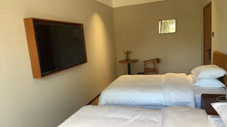 Xinyuan Yuji Courtyard Homestay Отели в г. Синьюань