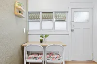 Rustic Rooms – Easy Access to Train & Amenities