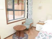 Turpan · Menghuiloulan Homestay (Grape Valley Scenic Area Qingwa Alley) - مطابخ