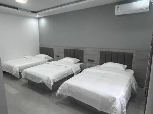 Dechang Xinai Hotel