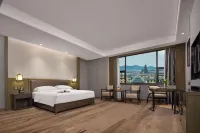 Henong Minzu Hotel Hotels near Wumiao Green Garden
