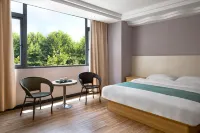 Shell Hotel (Wuzhou Wangcheng Plaza Sun Plaza) Hôtels à : Wuzhou