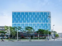 Vienna Hotel (Guangzhou G105 National Road Xialiang Subway Station) Hotel dekat Xilai Food Commercial Street