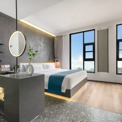 KM Boutique Smart Homestay (Jiaozuo Xinya) 人民公園周辺のホテル
