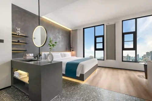 KM Boutique Smart Homestay (Jiaozuo Xinya)