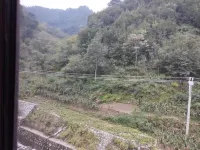 Yunhua Xigu Jiaxin Homestay - Bergblick