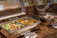 Ginkgo Qizhuang Hotel - servizio colazione