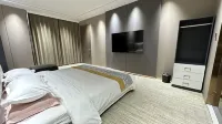 Yichun Xinqian Hotel - bar