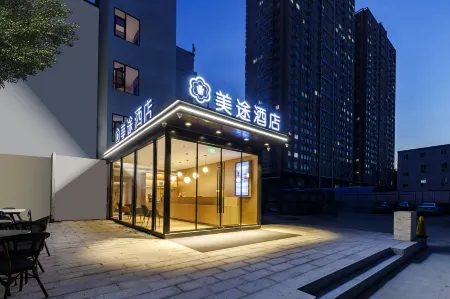 Meitu Hotel Отели рядом с достопримечательностью «Huanghe S & T College School of Information Engineering»