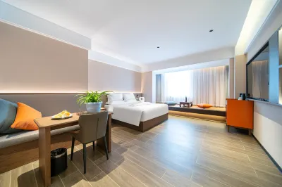 正軒飯店（天鵝河市政府店） 庫爾勒湖濱步行街附近的飯店