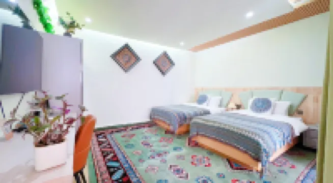 Tekes Muzi Bieyuan Homestay (Baguacheng Lijie Branch)