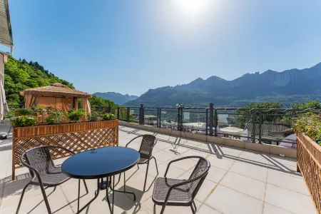 Enshi Shannan Tianyuan Homestay Отели рядом с достопримечательностью «Yunlong Shelter Bridge»