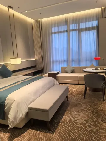 Jingmao Hotel (Danyang High-Speed Railway Station) Отели в г. Даньян