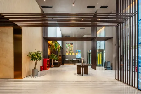 MEHOOD LESTIE Hotel (Zhengzhou East Station Zhengdong MixC Store) Отели рядом с достопримечательностью «Henan Traffic Technician Institute»