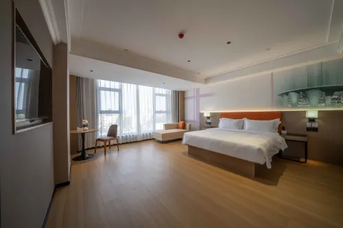 Rezen Huanxi Hotel (Huangchuan Sports Center Branch) - parcheggio