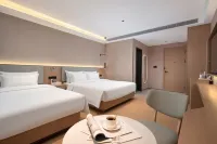 Junyi Resort Hotel (Lingshui High-speed Railway Station Haiyun Plaza Branch) - Haustierfreundliche