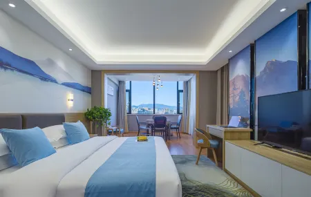 Manyuegu Holiday Hotel Отели рядом с достопримечательностью «Xianghe Square»