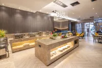 Huaju Hotel (Wenfeng World Store, Middle Jianghai Road, Qidong) - Desayuno