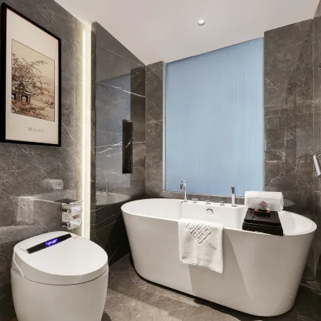 QIANNAHOTEL SPLENDOR(Zhengzhou East Railway Station Longzihu University District) Отели рядом с достопримечательностью «Школа Чуньхуа, Новый район, Цуэндун»