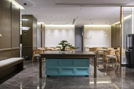 Weiyejia Hotel (Shuiduhe Subway Station, Wanjia North Road, Changsha) Отели рядом с достопримечательностью «Hunan Engineering Polytechnic»