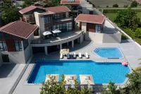 Taoli Health Begonia Resort Villa Hotel Hôtels à : Sanya