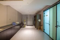 YI GE XIN WISDOM HOTEL - gimnasio