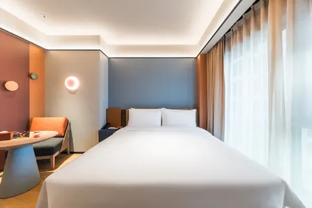 Orange Hotel (Yichang Wuyi Square Yanjiang Avenue) Отели в г. Ичан