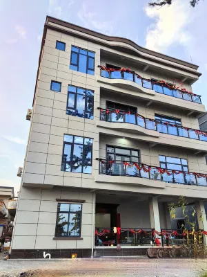 Naozhou Island Xingchen Yuhai Homestay Отели рядом с достопримечательностью «Лампа Чжоу»