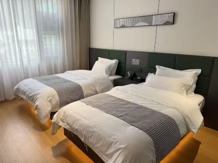 Shuimo Yunzhong Hotel (Motuo Visitor Center) Отели рядом с достопримечательностью «Renqinbeng Temple»