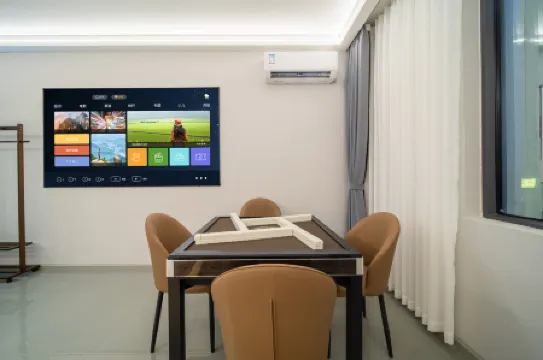 Changxing Smart Hotel (Mengzi Nanhu Park) Отели в г. Мэнцзы