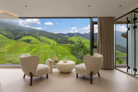 Longsheng Longji Qianmo Jian Homestay Отели рядом с достопримечательностью «Golden Buddha Peak View Point»