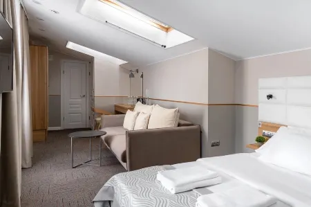 KamInn (КамИнн) Отели рядом с достопримечательностью «выстрелка о времени»