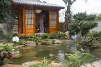 Yuzhuwan Manju Homestay (OMG Heartbeat Paradise Branch) - avec sources thermales
