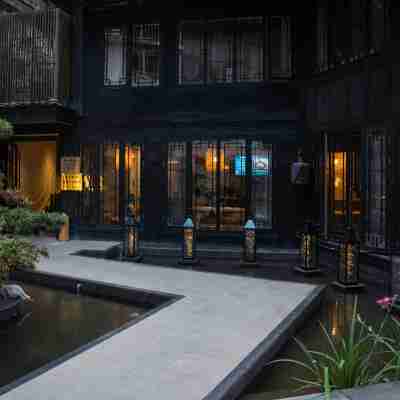 西江三春裡·孟度假飯店 Hotel Exterior