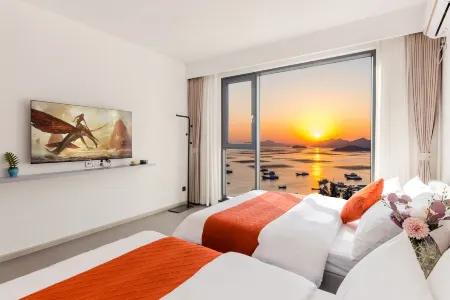 Floral Hotel·Xiapu three-night hotel (Sansha Dongpidian) Отели рядом с достопримечательностью «Huazhu Village»