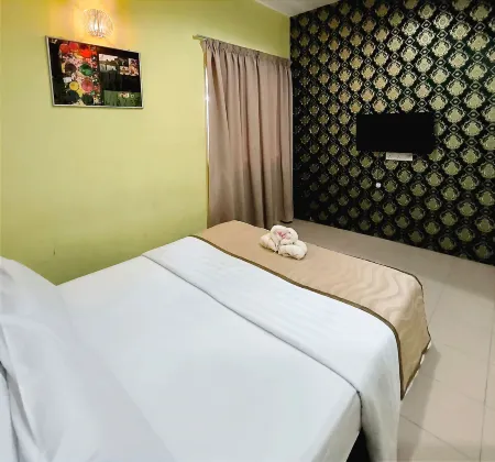 Hotel O Rumah Rehat Awana Отели рядом с достопримечательностью «Парк Аспен Вижен Сити Сентрал»