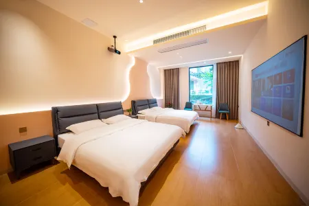 Qingyuan Zhuyijuju Отели рядом с достопримечательностью «Qingxin Culture Sports Center»