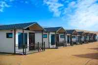 xingyaodadishamoguanxingjiudian