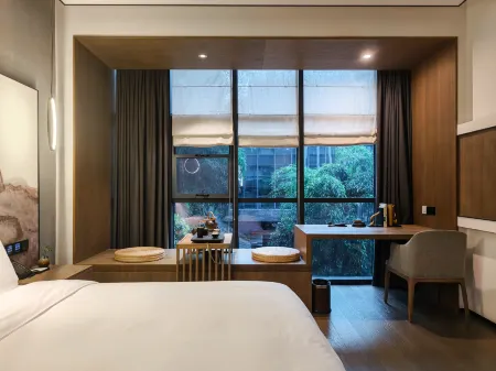 Chengdu Chanyi Jincheng Courtyard Hotel Отели рядом с достопримечательностью «Sichuan Daxue Jincheng College»