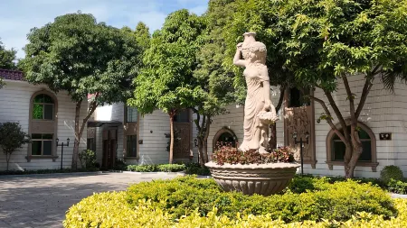 New Haojing Hotel (Guangzhou Xintang Metro Station) Отели рядом с достопримечательностью «Siwanggang Park»