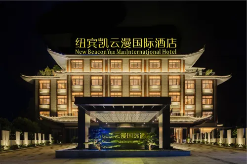 New Beacon Yunman Internation Hotel (Yingshan Tourist Center Chaxiang Small Town) Hotels in Yingshan