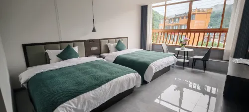 Jinnong Homestay (Xijiang Qianhudao Miao Village Branch) - บริการรถรับส่ง