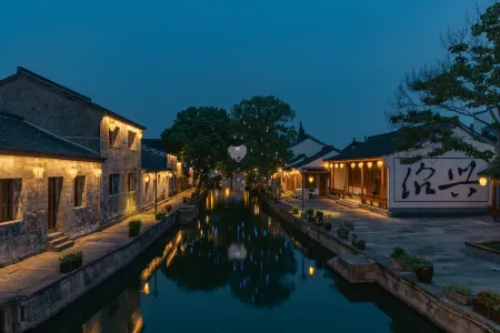 Tingjian • Dongpu | Jiuyitang Holiday Homestay (Shaoxing Huangjiu Town Branch) Отели рядом с достопримечательностью «Datong School»