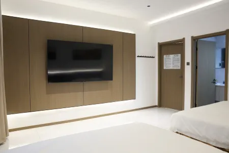 Shanshui Danqing Chinese Inn Отели рядом с достопримечательностью «Народное правительство Тунг-Ван»