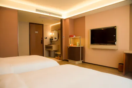 Jinju Hotel (Liansheng Happy City Railway Station) Отели в г. Дэань