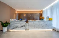 Jiudian Hotel (Lingao Fuluo Tianjie Bus Station Branch)