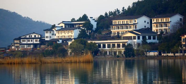 Nanbei Lake Huguang Shanju Holiday Hotel Отели в г. Хайянь