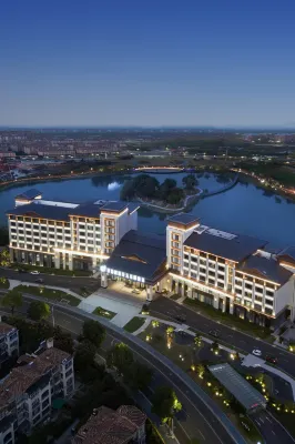 Grand New Century Hotel Xuyi Huai an - parking