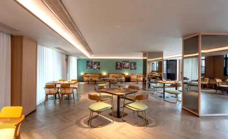 Orange Hotel (Wenzhou Longwan Wanda Branch) Отели рядом с достопримечательностью «Tianzhu Temple»